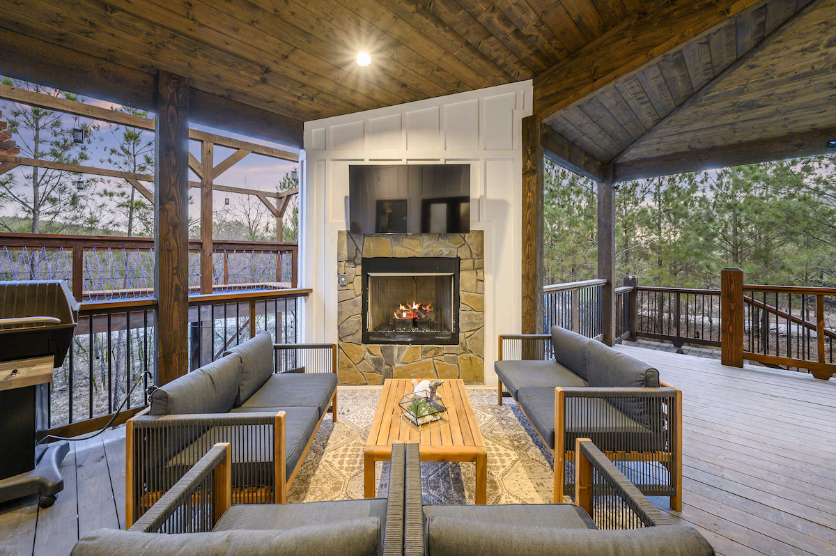 Outdoor lounge seating around the deck fireplace